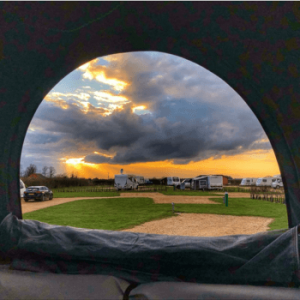 View of the caravan site through an awning